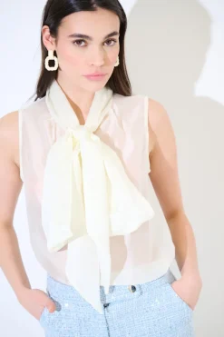 Best KIKISIX TOP SMANICATO CON MAXI FIOCCO VOILE PANNA